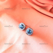 Load image into Gallery viewer, Individually Hand-crafted Pair of Silver Swiss Blue Topaz Gemstone Studs surrounded by Cubic Zirconia & Rhodium.