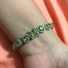 Load image into Gallery viewer, Individually Hand-crafted Peridot Gemstone Silver Bracelet surrounded by Cubic Zirconia & Rhodium.