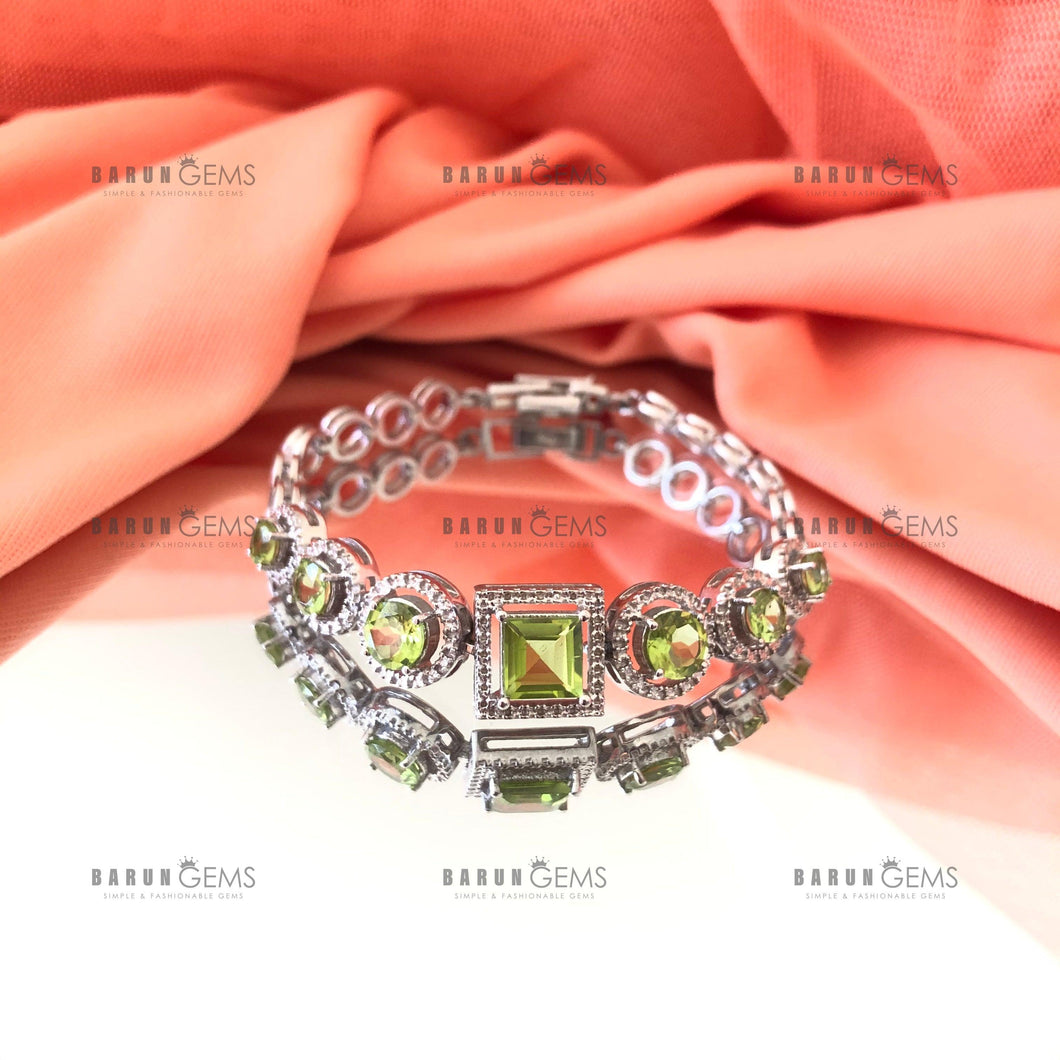 Individually Hand-crafted Peridot Gemstone Silver Bracelet surrounded by Cubic Zirconia & Rhodium.