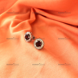 Individually Hand-crafted Pair of Silver Red Garnet Gemstone Studs surrounded by Cubic Zirconia &amp; Rhodium.