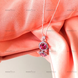 Individually Hand-crafted Silver Pink Topaz Gemstone Pendant Necklace surrounded by Cubic Zirconia &amp; Rhodium.